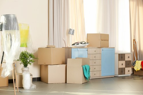 Loading household items into a van for an Earls Court relocation
