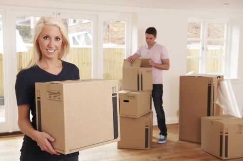 Packed moving boxes and labels ready for residential or office relocation in Earls Court