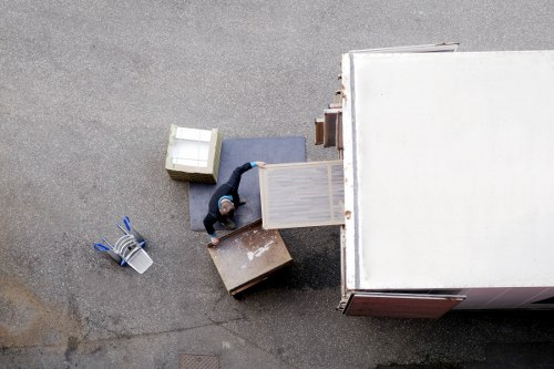 Earls Court moving team handling furniture and boxes carefully