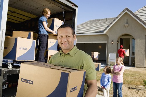 Local movers handling office desks and storage items in Earls Court