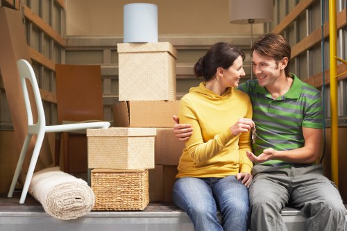 Movers handling stairs and tight access in a London flat